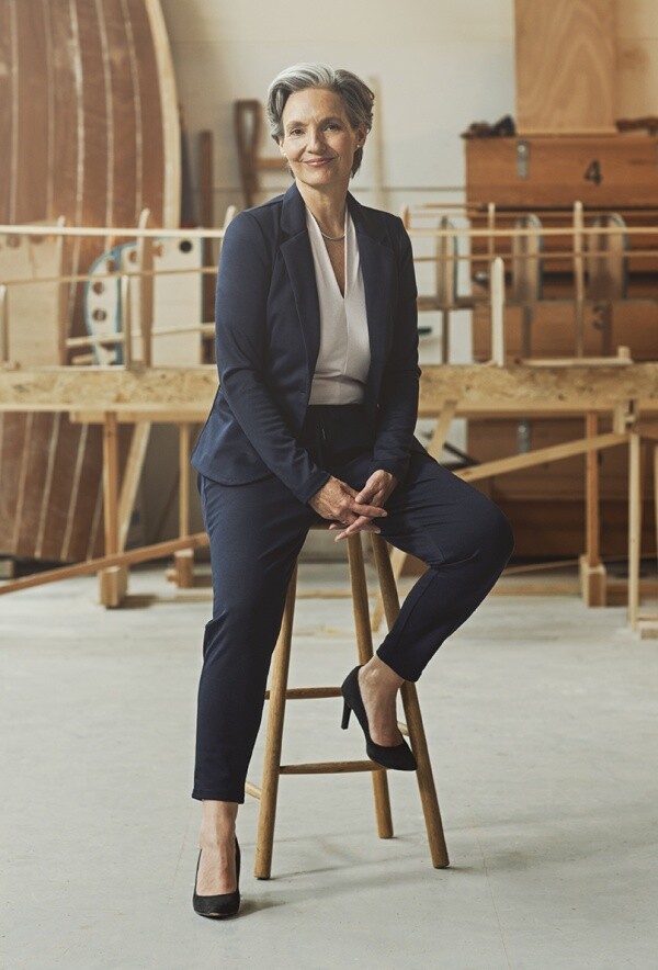 Behind the scene - woman sitting on a chair
