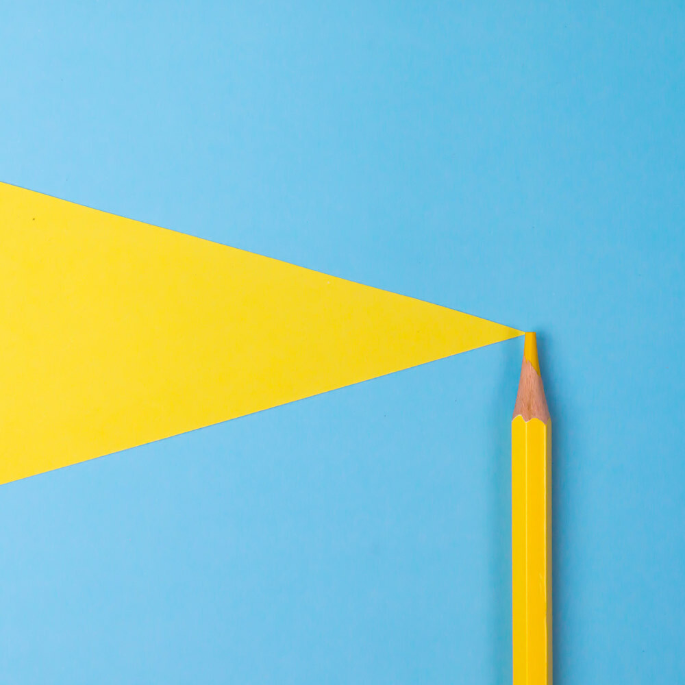 Pencil with a light beam looking like a lighthouse