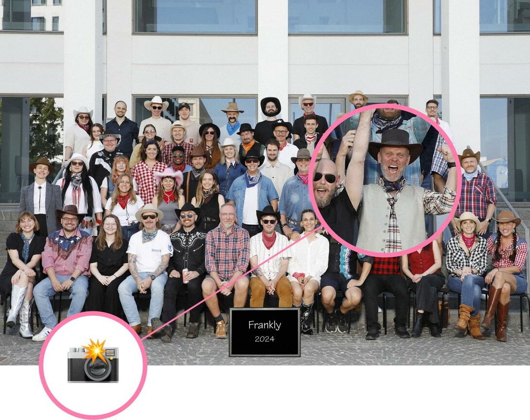 Fun image of all Frankly employees with their hands in the air